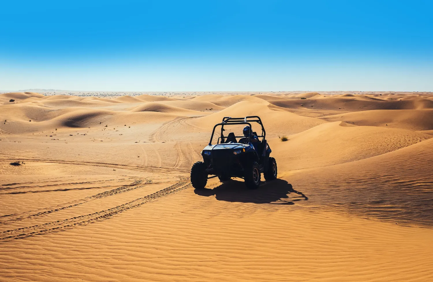 extreme riding quad buggy bike sand dunes dubai desert safari tour